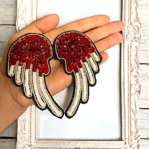 feather brooch