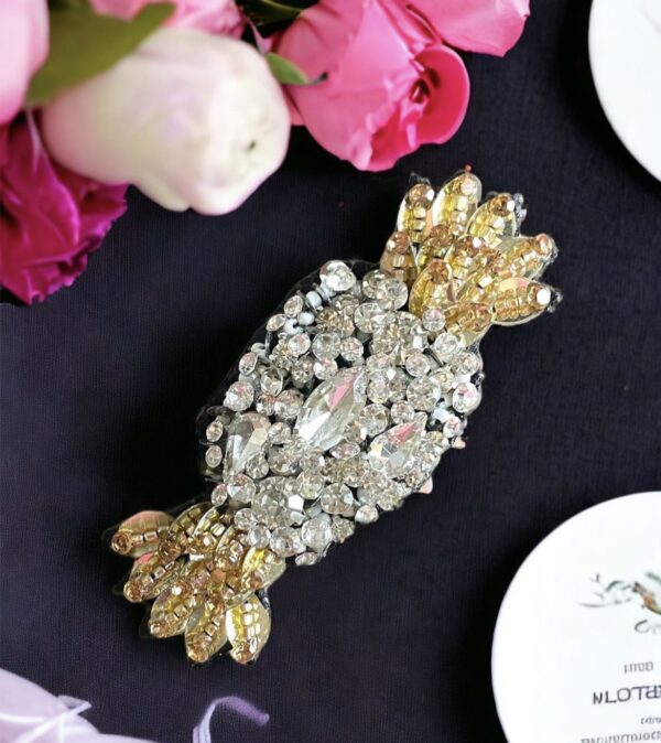 Silver golden toffee brooch