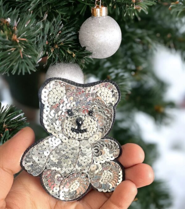 Silver teddy brooch