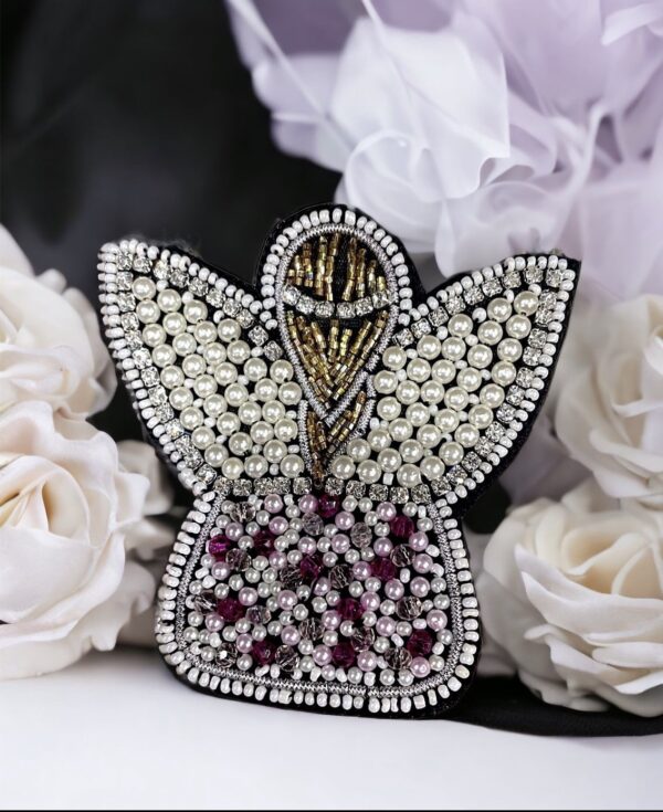 Winged angel brooch