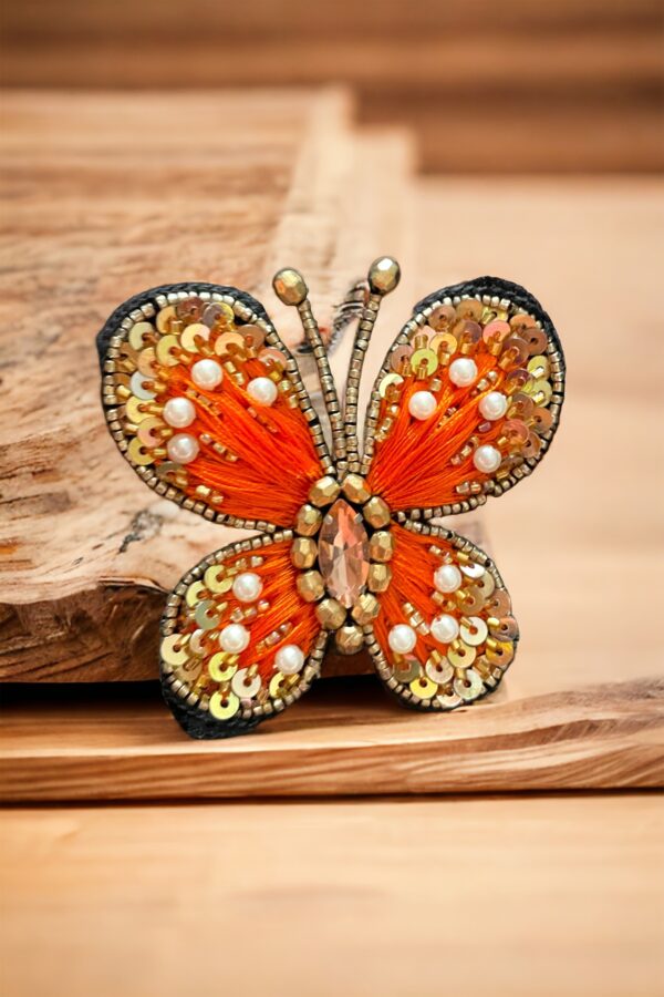 Orange tangy butterfly brooch