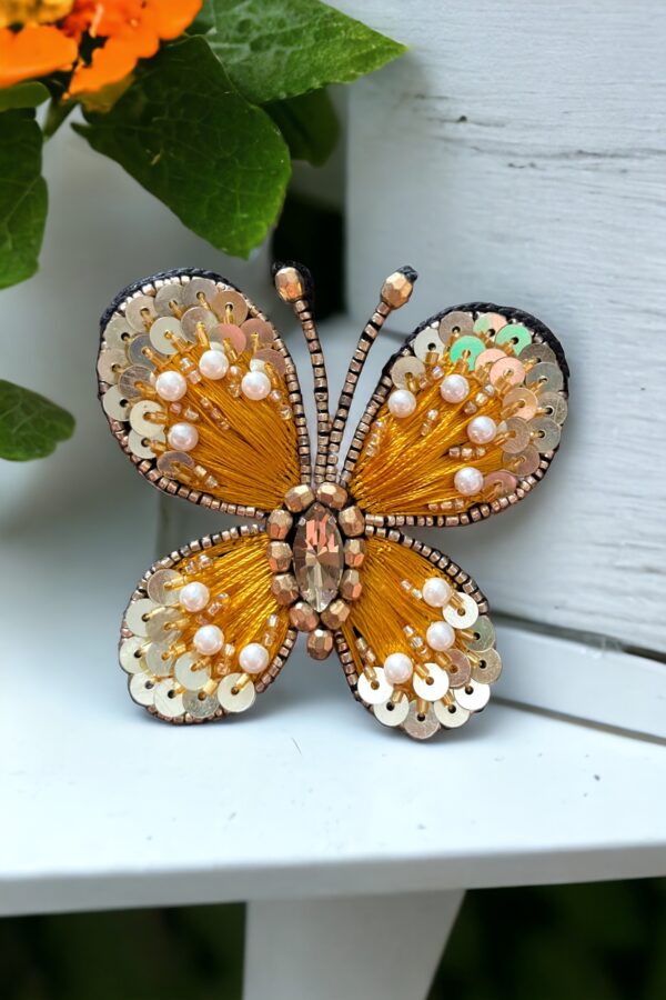 Yellow butterfly brooch