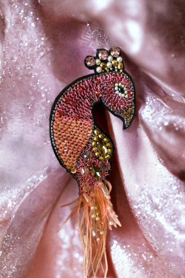 Pink peacock brooch