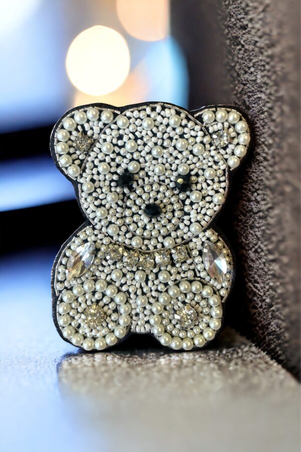 White teddy brooch