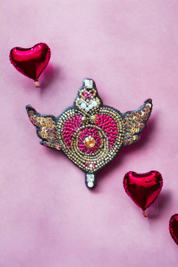 Pink crown brooch