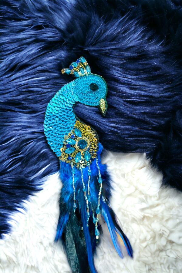 The blue peacock brooch