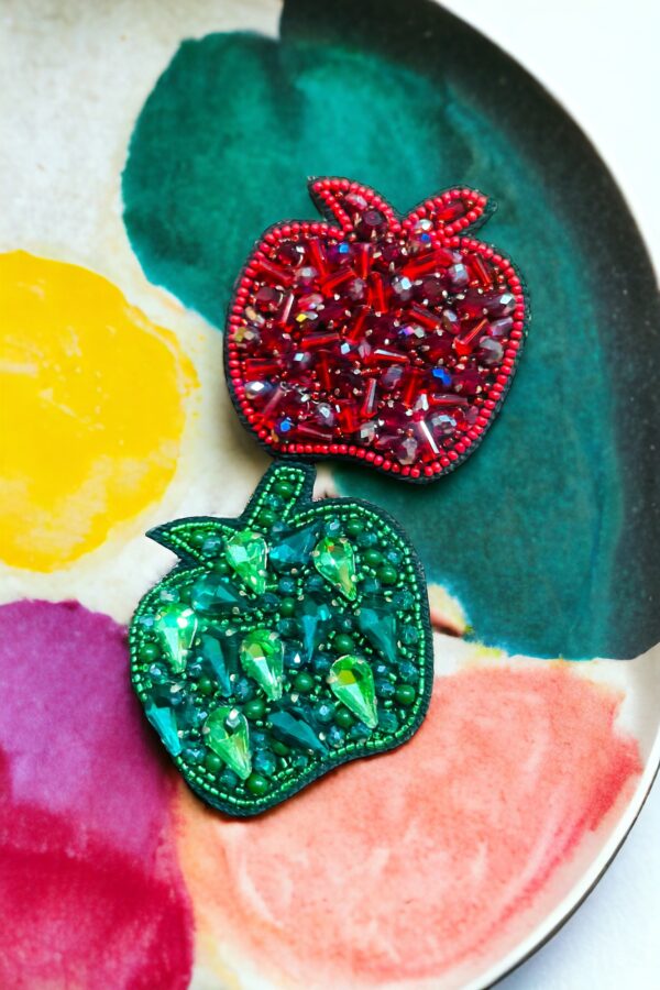 The Apple brooch