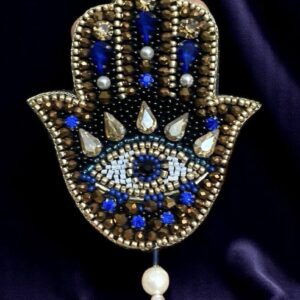 Palm evil eye brooch