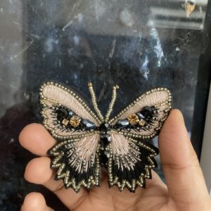 Beige black butterfly brooch